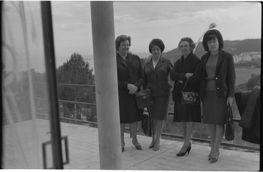 Persones assegudes en un saló el dia de Rams